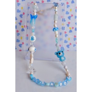It's a boy blue beaded necklace choker