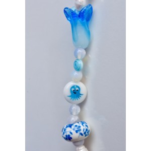 Collier bleu en perles de verre murano et porcelaine