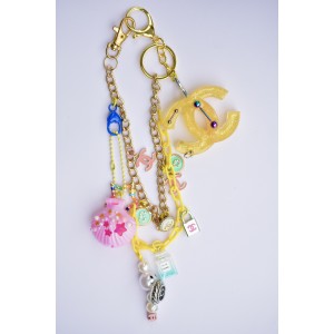 Attache de sac jaune grigri polly pocket