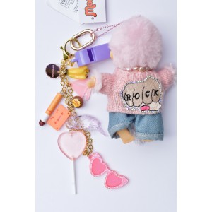 Bijou de sac  kiki peluche singe avec ses grigris