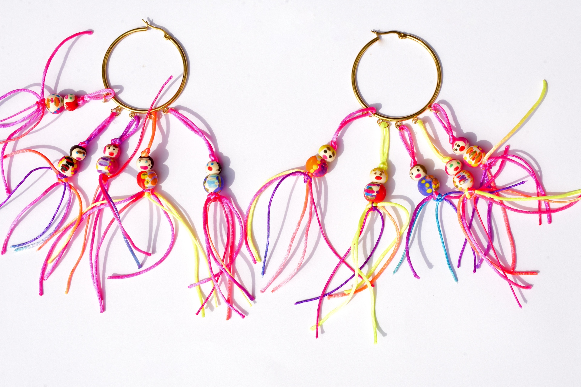 lucky dolls hoop earrings