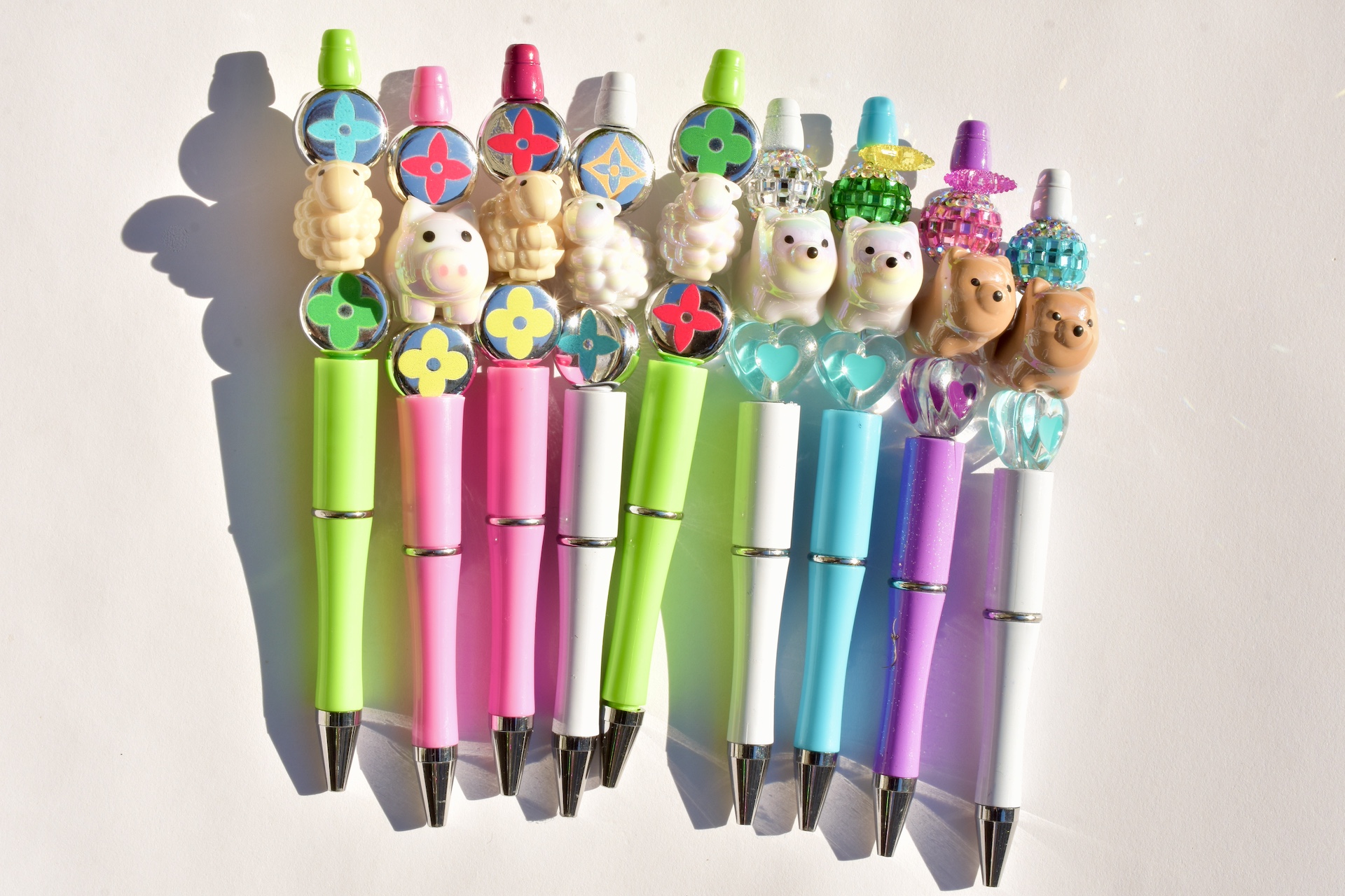 Fantasy pens with animals and pearls